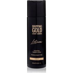 Dripping Gold Luxury Tanning Lotion nawilżające mleczko samoopalające do uzyskania intensywnej opalenizny odcień Medium 200 ml