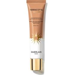 GUERLAIN Terracotta Joli Teint Protecting Tinted Moisturizer podkład rozświetlający nadający naturalny wygląd SPF 20 odcień 30 Sunwarm 30 ml